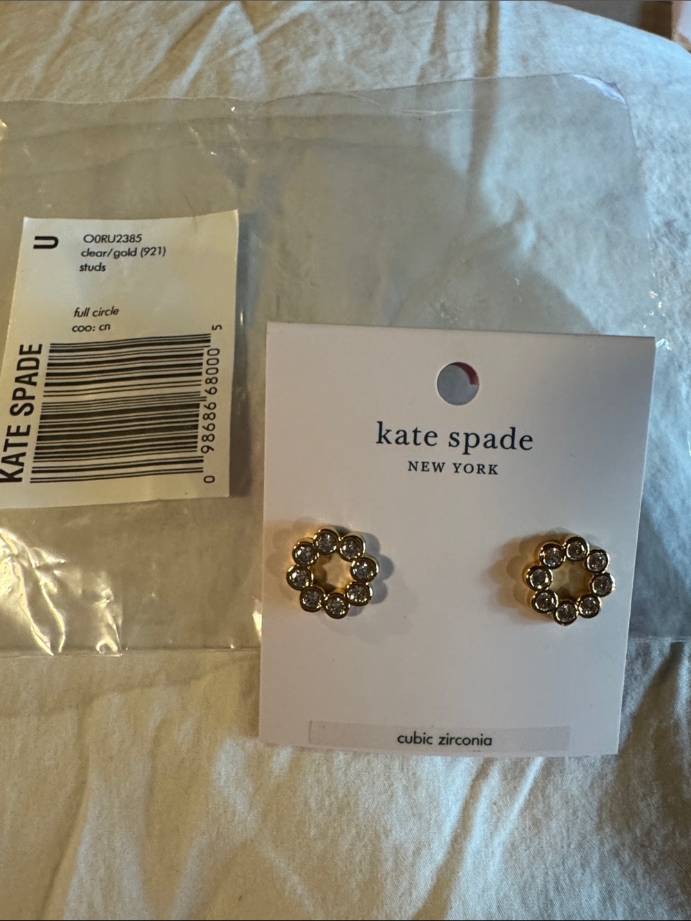 kate spade “full circle” gold-tone clear stone floral circle stud earrings